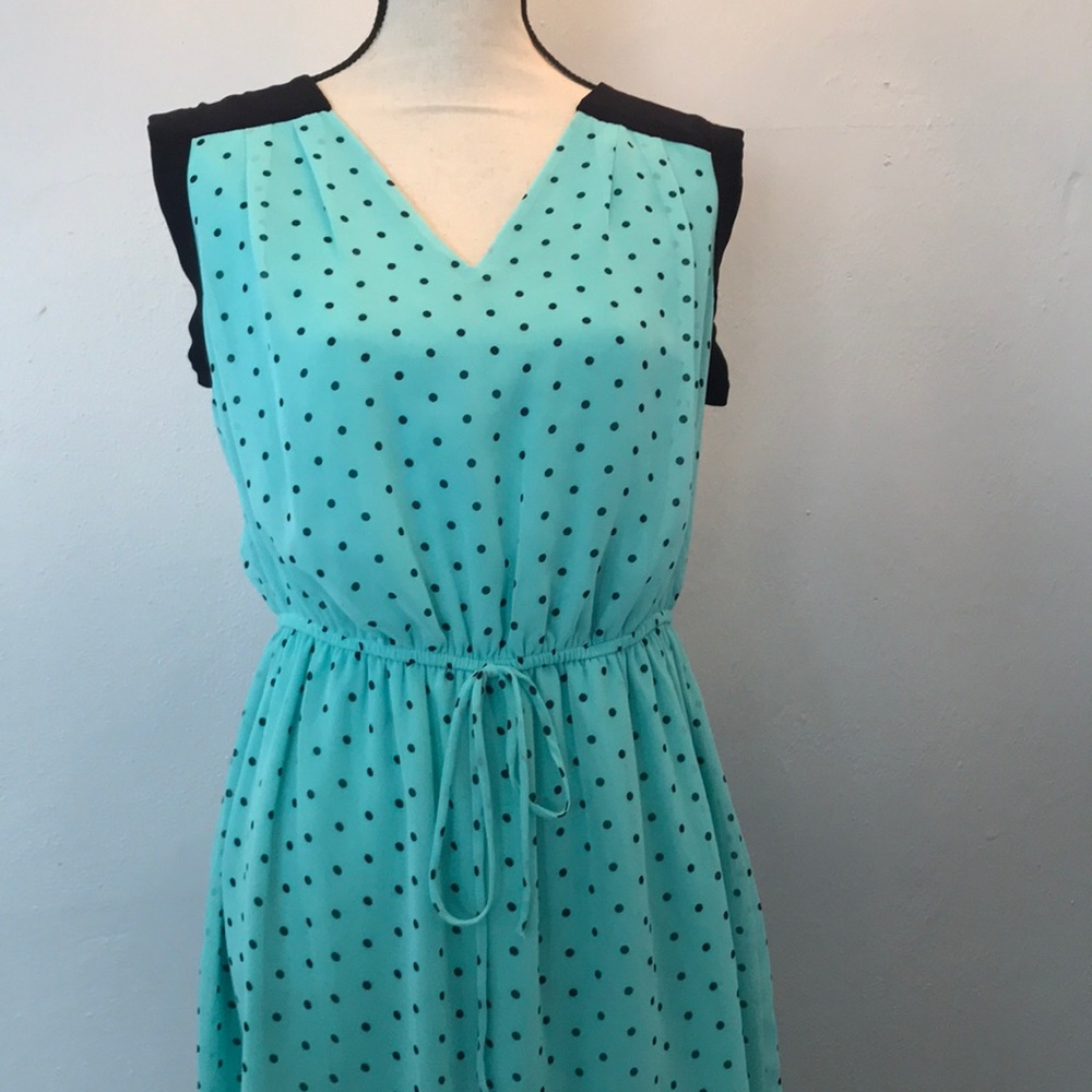Turquoise dress with navy blue polka dots and trim